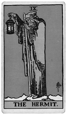 Tarot card titled 'The Hermit' depicting an old man holding a lantern in a snowy landscape.