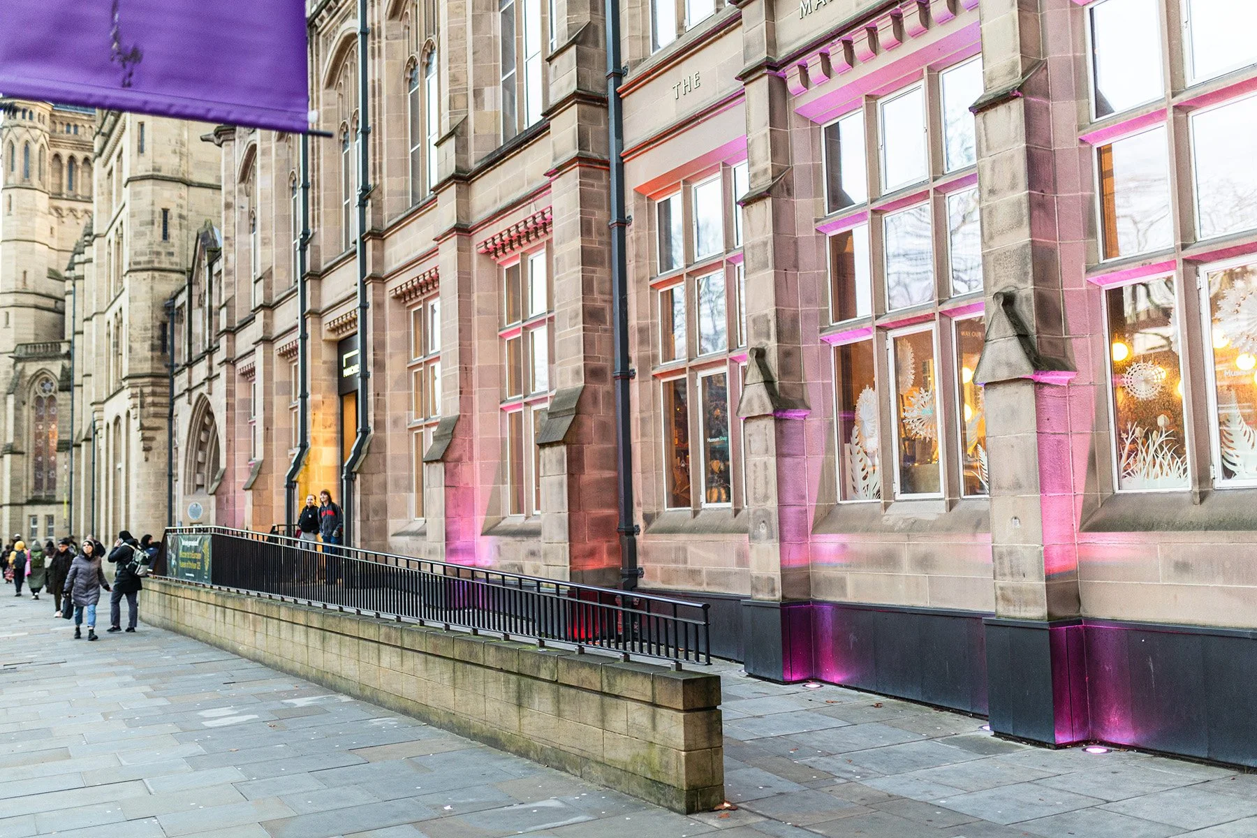 Exterior view of Manchester Museum's main entrance, showing the access ramp.