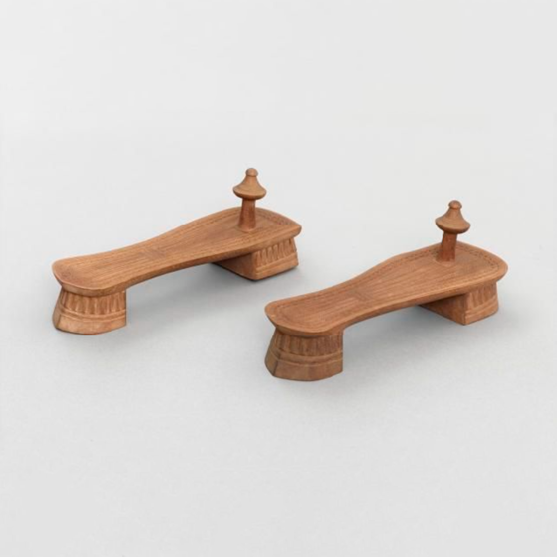 A pair of wooden sandals.