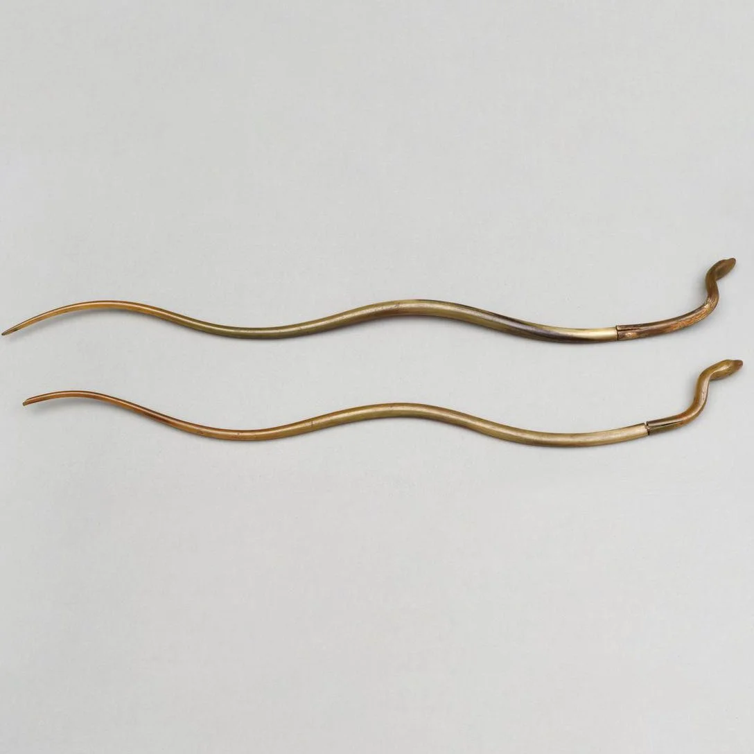 Snake wand of bent horn, made in two parts.