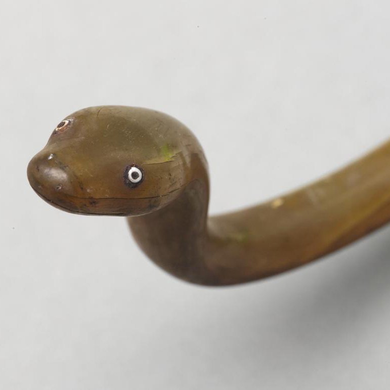 Snake wand of bent horn, made in two parts.