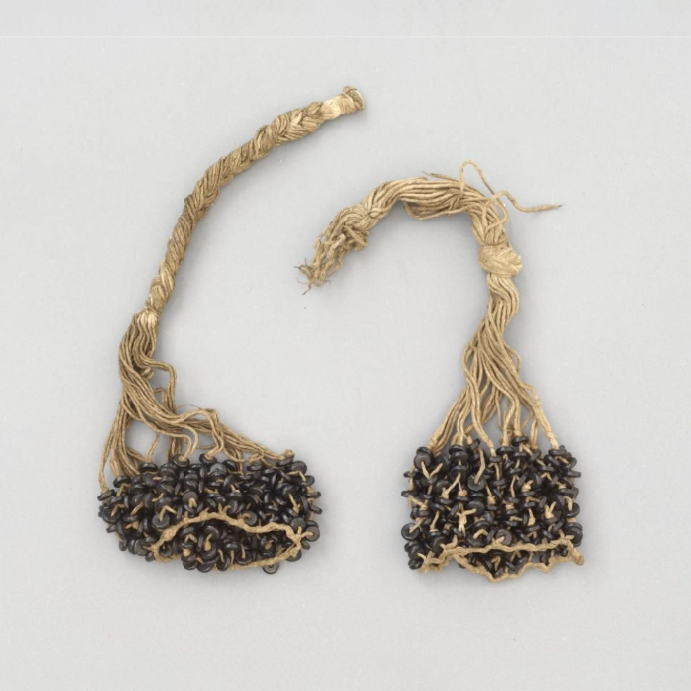 Musical instrument made from string and beads.