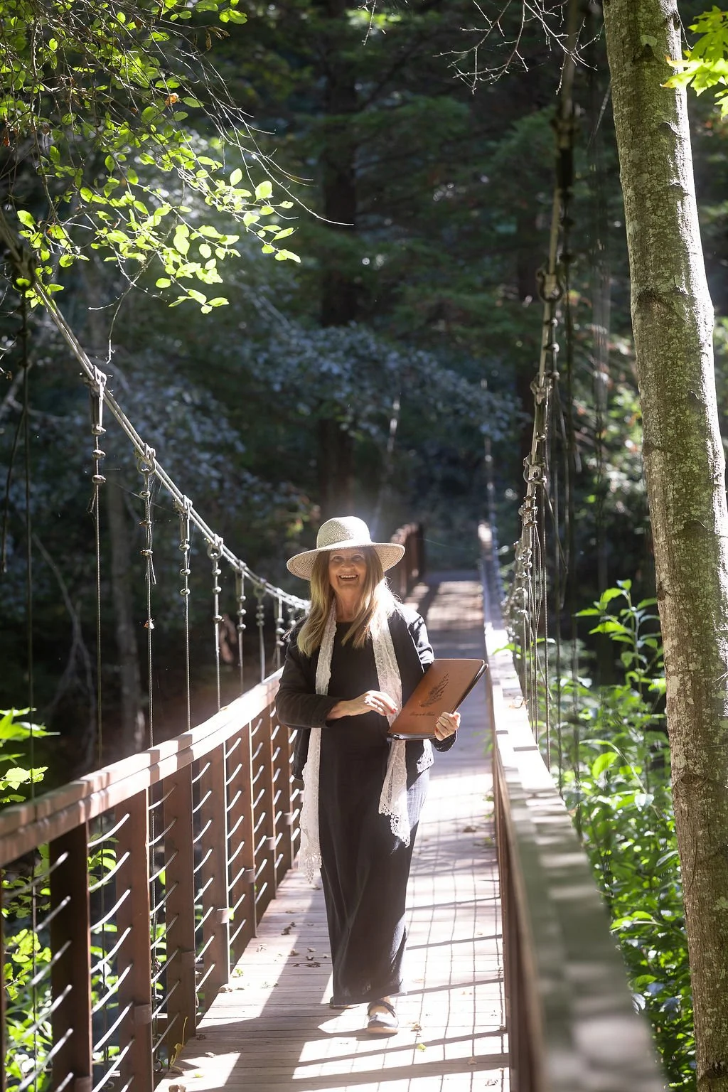 Ceremony at Glen Oaks in Big Sur with Officiant crossing the bridge