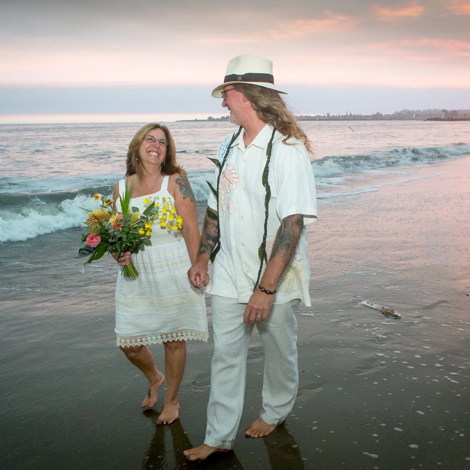 Elopement on Blacks Beach at sunset in Santa Cruz