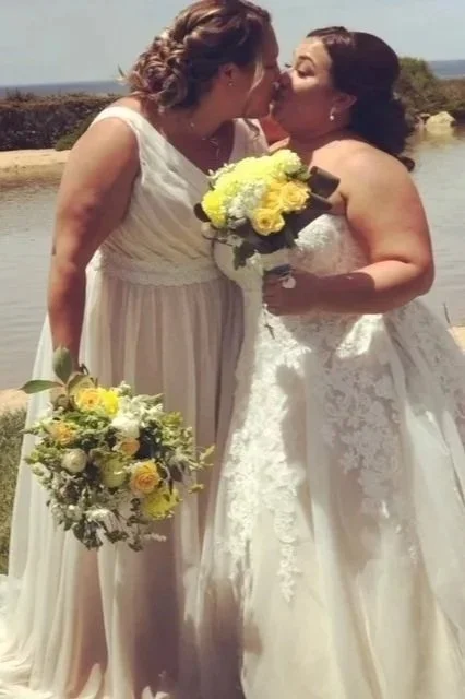 Two Brides first kiss at Seascape Beach Resort