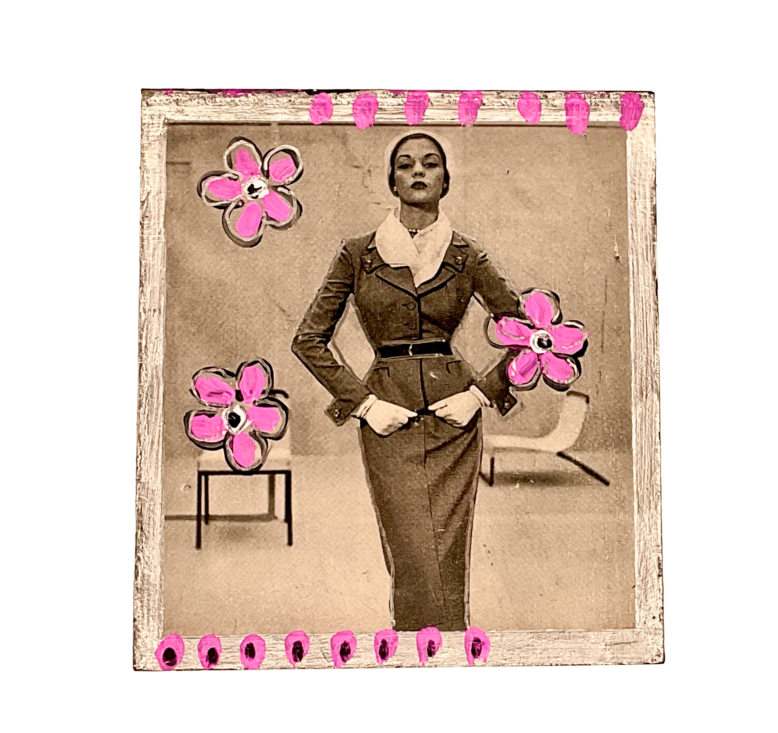 Straight-on view of a tissue box cover featuring an authentic 1950s Vogue model in a tailored suit, accented with hand-painted pink flowers and silver border detailing.