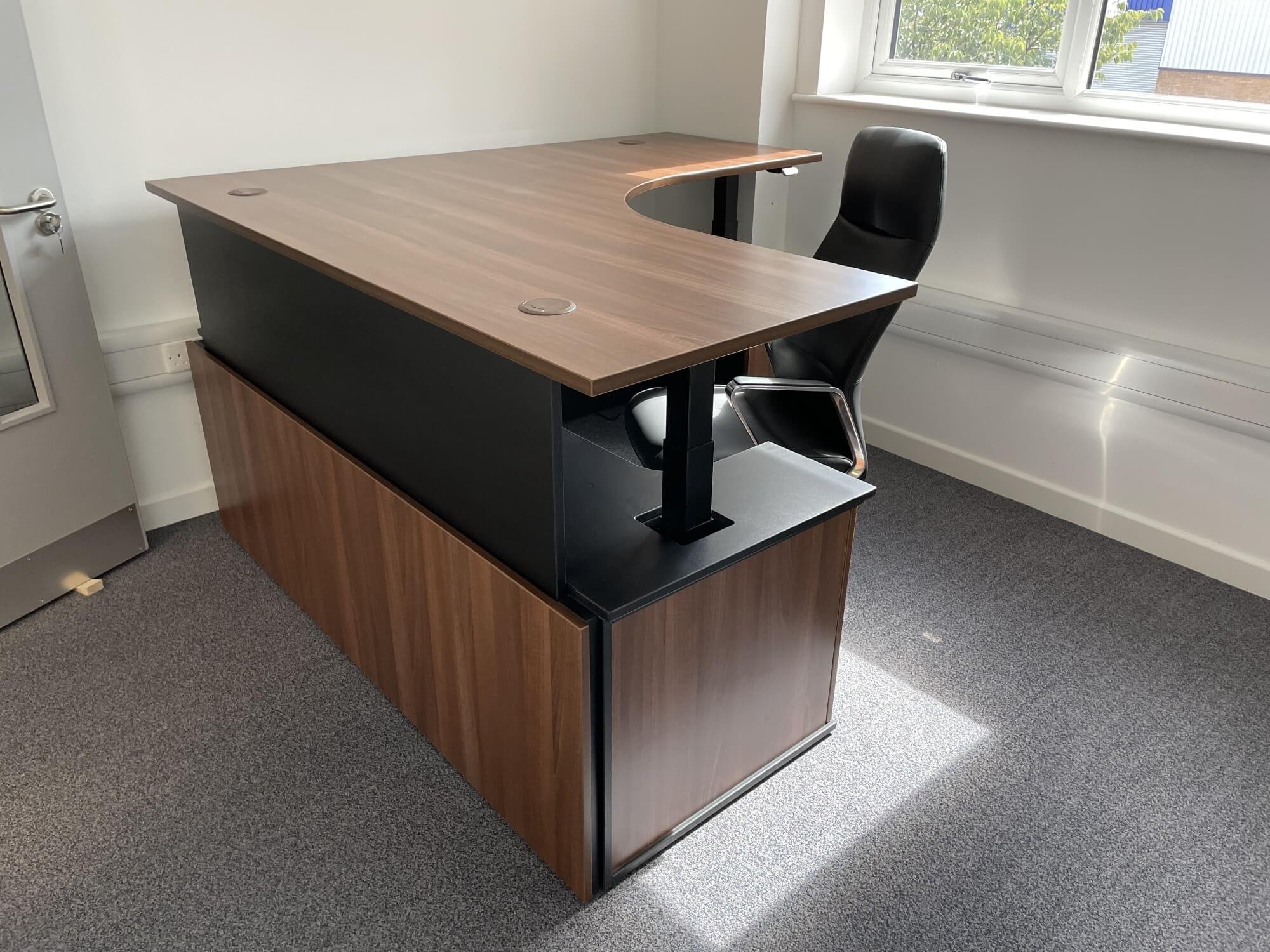 2x Vice Principals Office - Height Adjustable Desk in a Walnut finish (shown raised height)