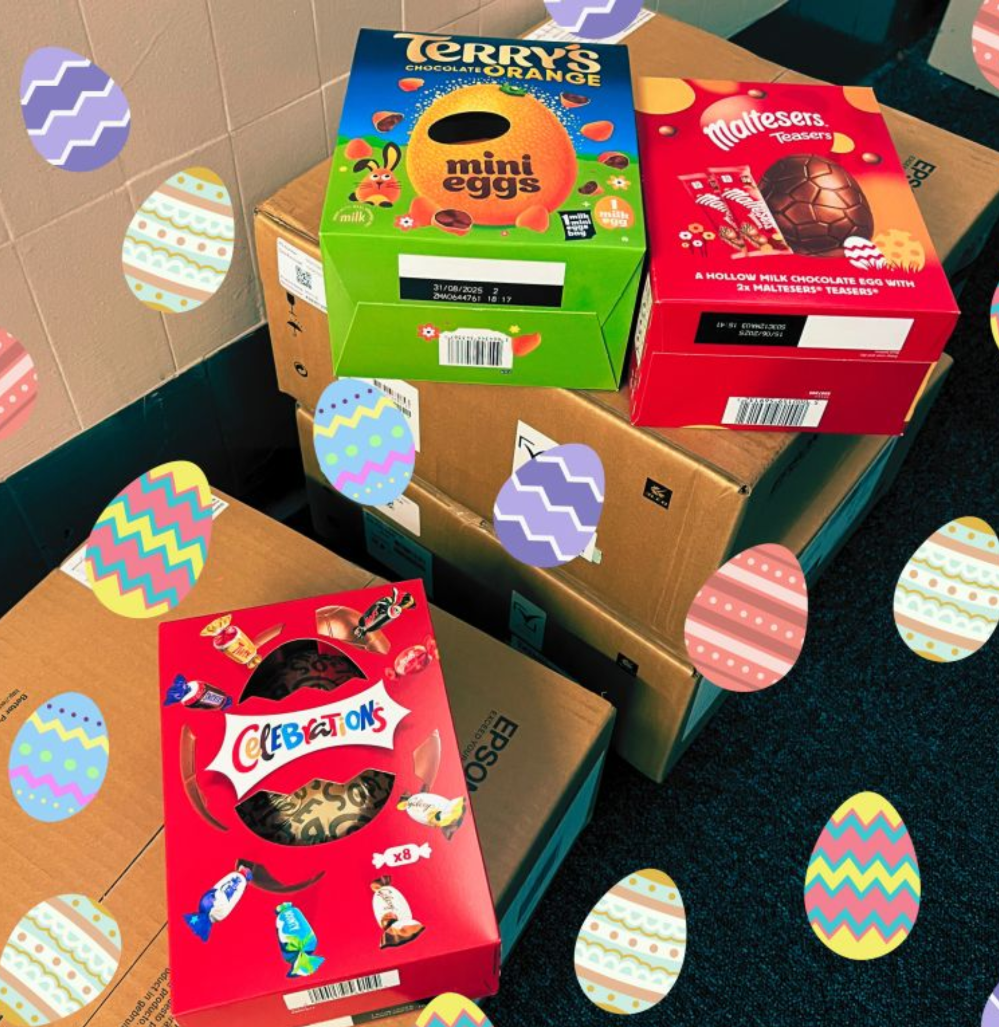 Boxes of Easter chocolates and candies on cardboard boxes with decorative Easter egg overlay.