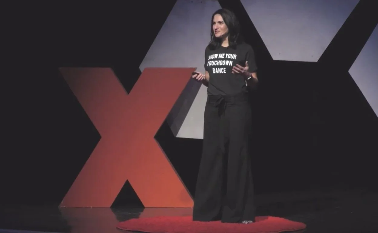 Amy Siegfried, networking speaker and coach, delivering TEDx keynote.