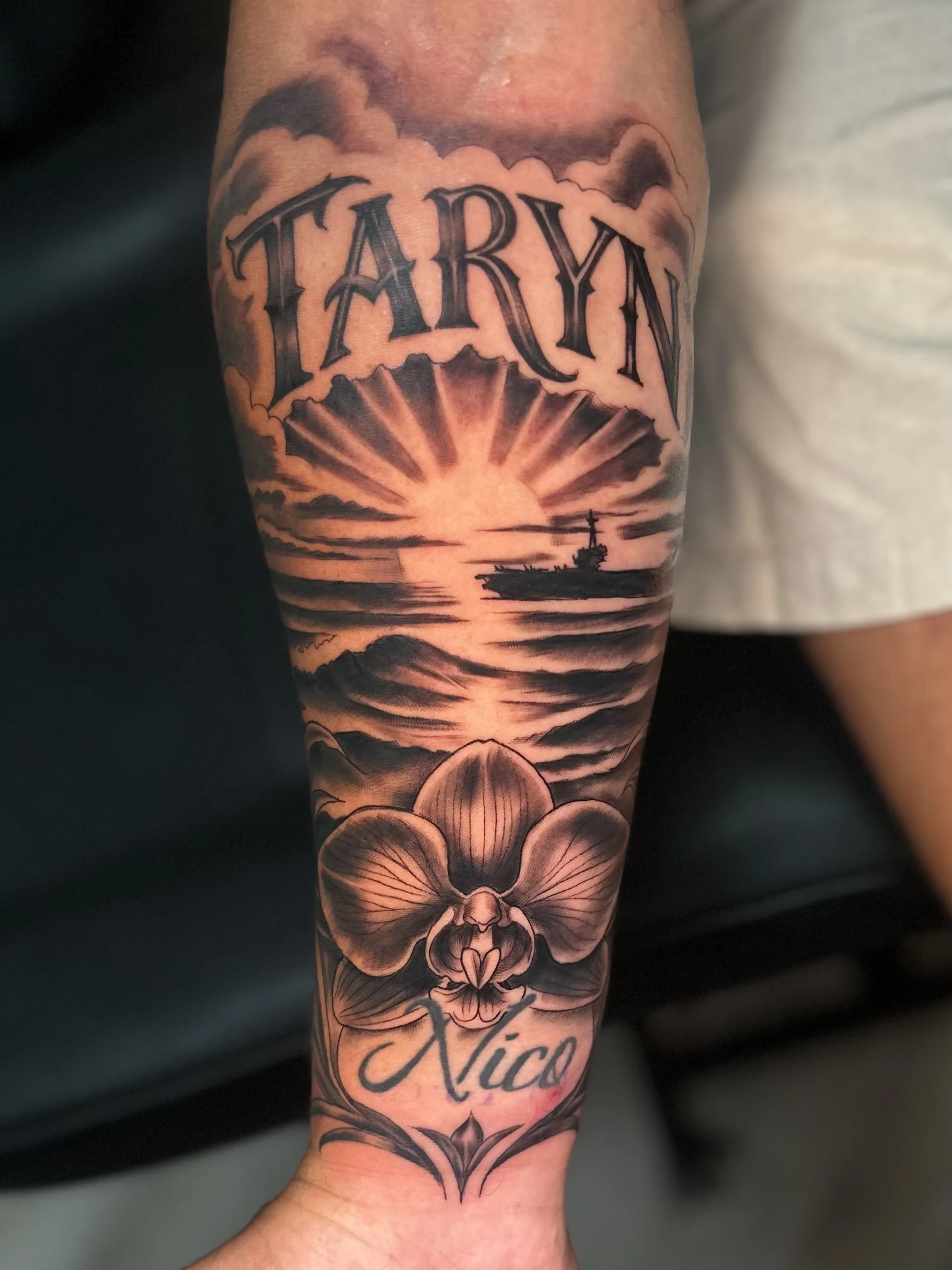 Black and grey navy ship tattoo by Mike Raya at Judgment Day Tattoo in Fort Eustis, VA