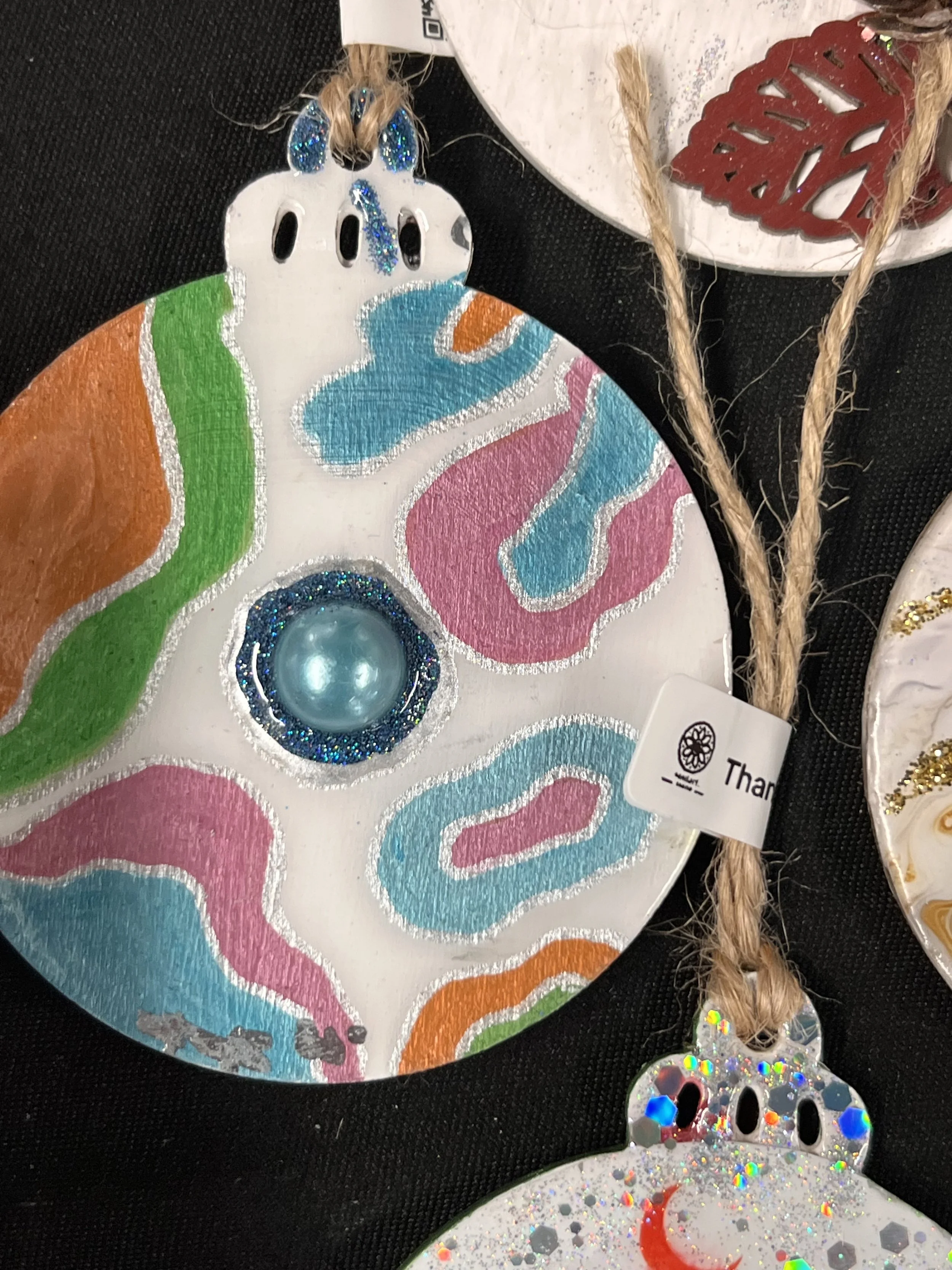 Hand made Christmas baubles, wood based double sided with resin