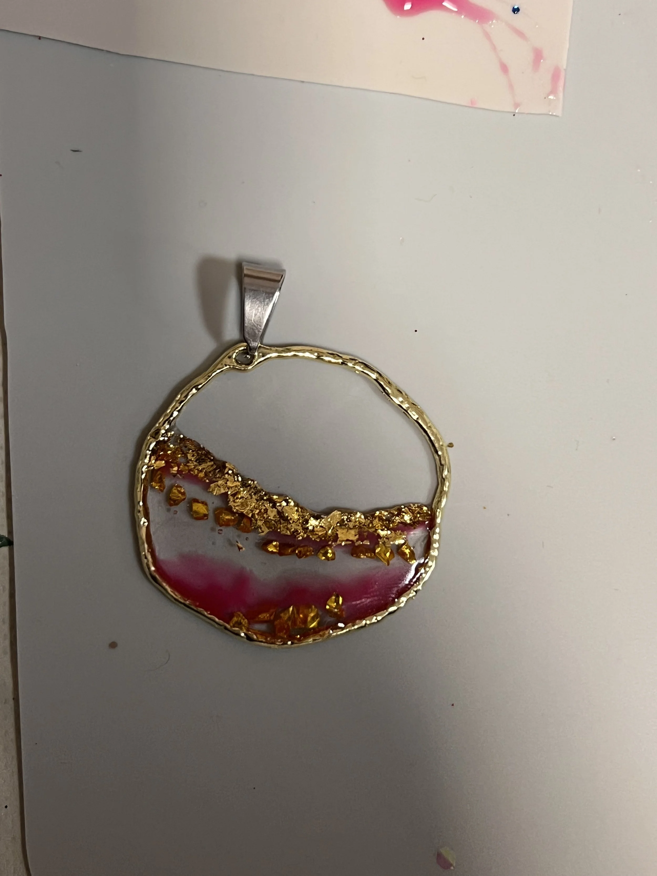 Resin art pendent created at a workshop