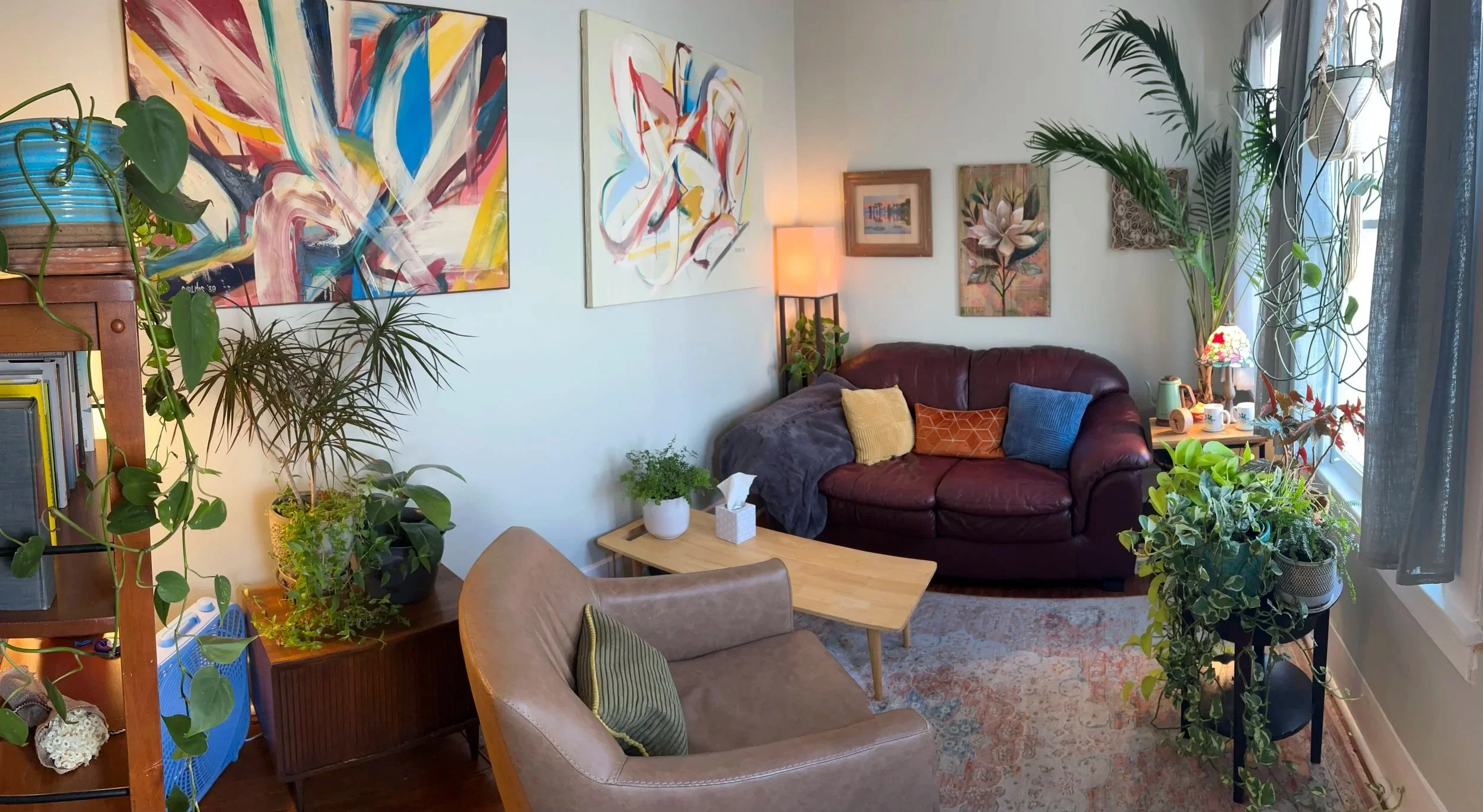 Therapy office at New Orleans Counseling Alliance with plants and natural light