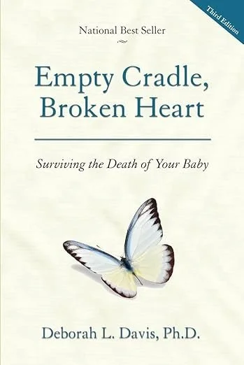 Book cover titled 'Empty Cradle, Broken Heart: Surviving the Death of Your Baby' by Deborah L. Davis, Ph.D., with a butterfly illustration. Third edition.