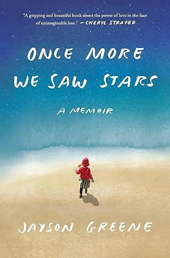 A person with a red jacket and black and white pants walking on a sandy beach towards the ocean with a blue sky above, on the cover of a book titled 'Once More We Saw Stars' by Jayson Greene.