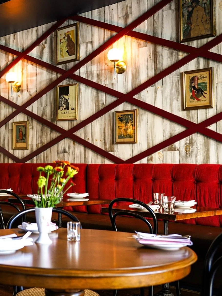 Step into your neighborhood bistro, where the lights are warm, the wine is flowing, and staying a little longer always feels like the right idea. ✨🍷