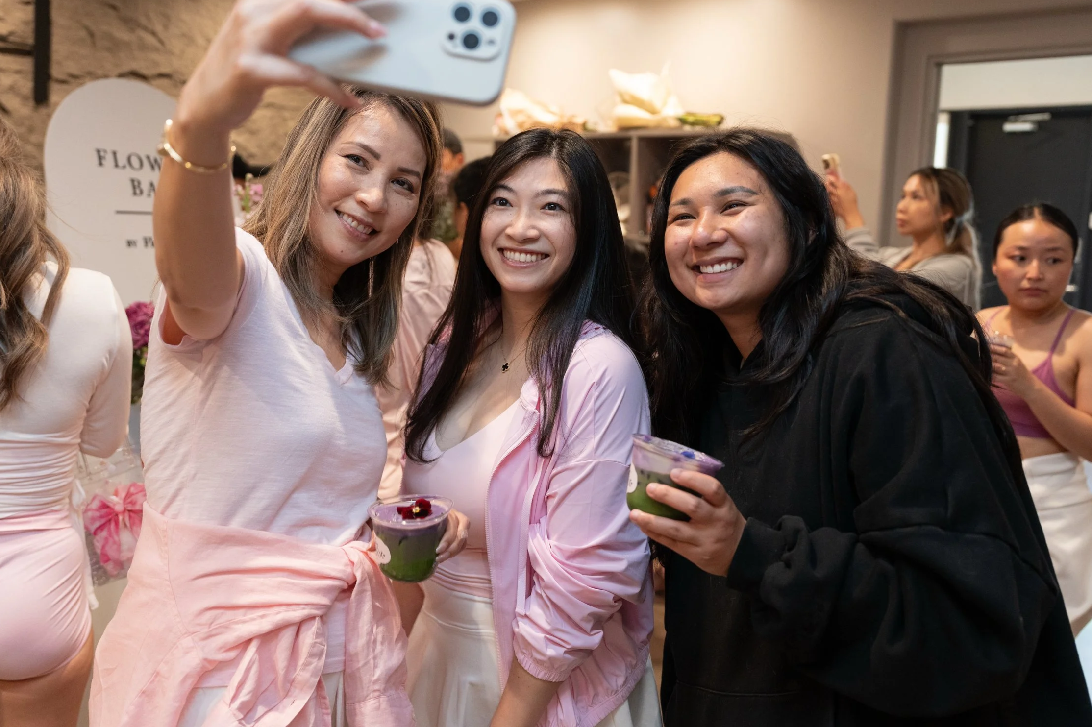 Guests enjoying matcha drinks together at a catered event by The Soft Spot