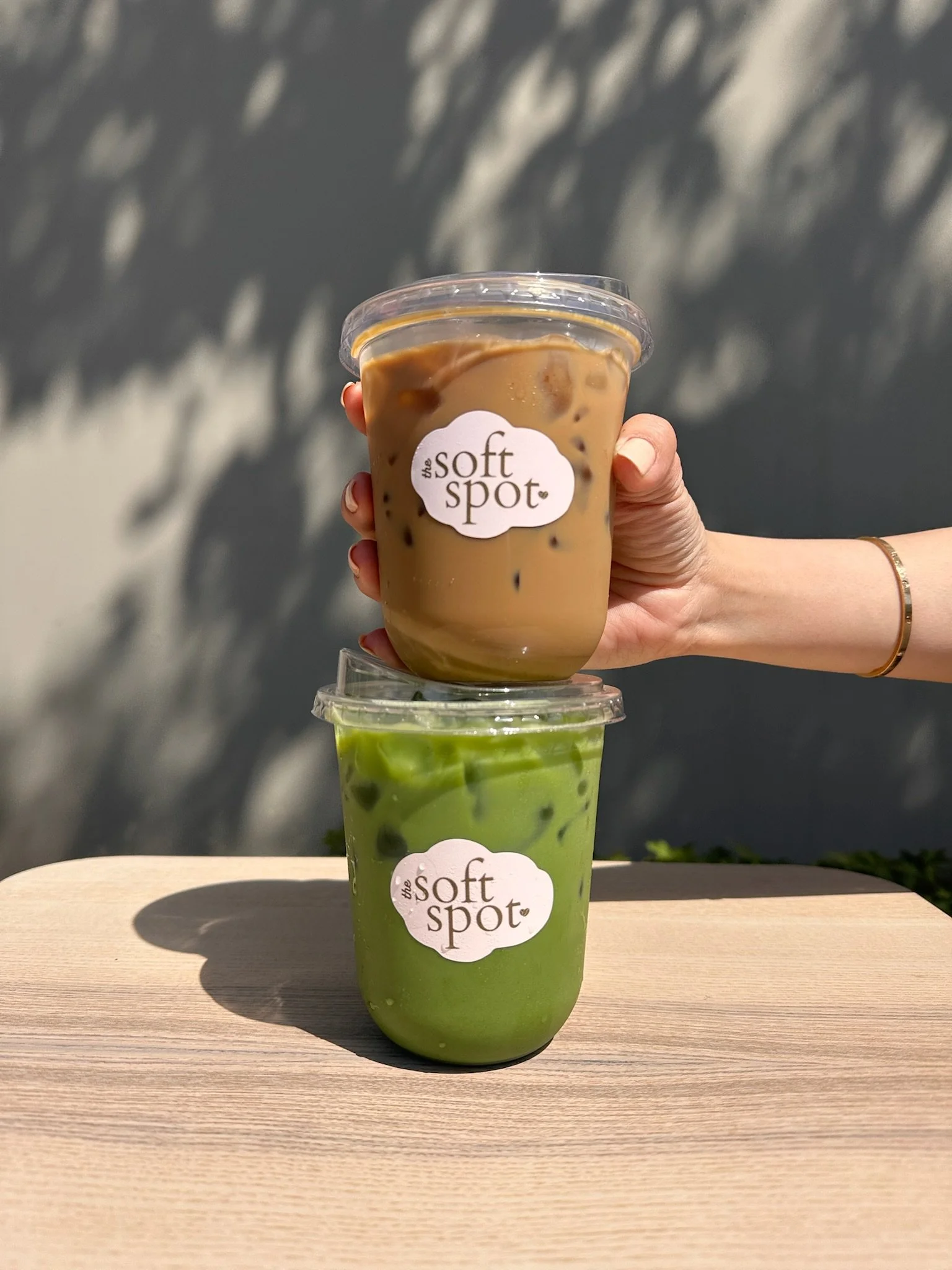 Matcha and espresso drinks prepared by The Soft Spot in natural light