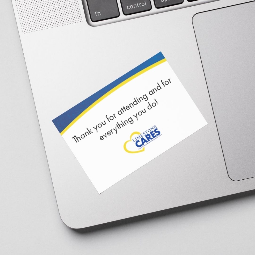 thank you card sitting on laptop hand rest