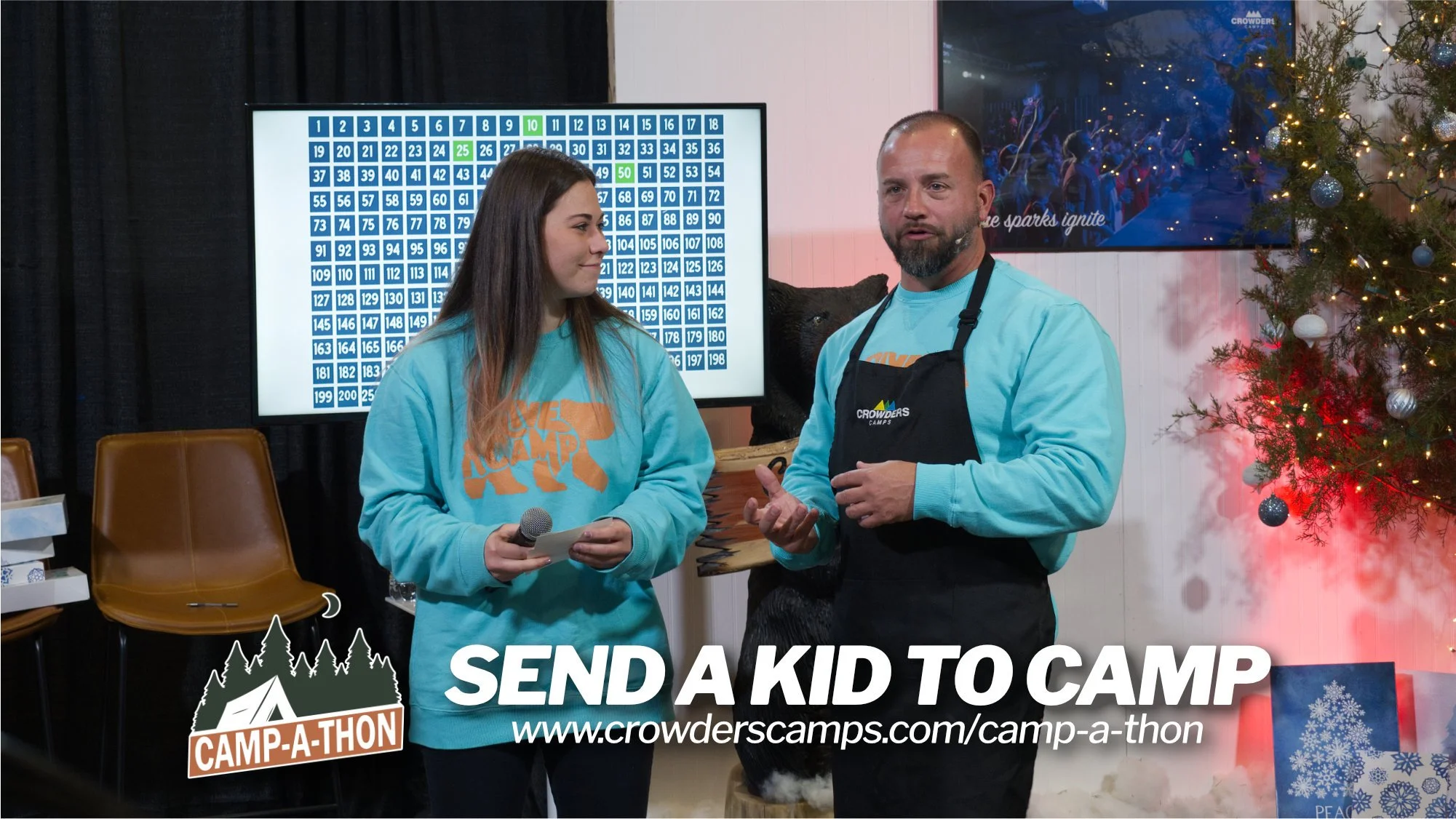 a man and a girl talk about how to donate to camp-a-thon