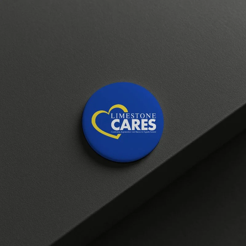 blue button on dark gray desk