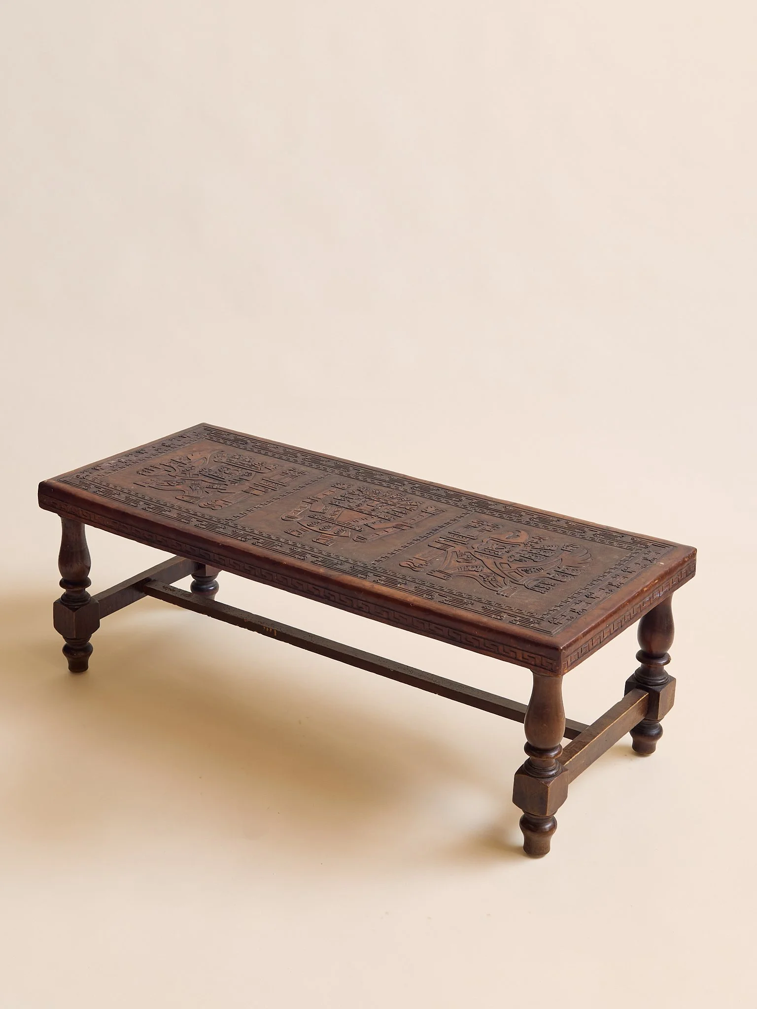 23_TheVintagePeruvianLeatherCarvedCoffeeTable_003.jpg