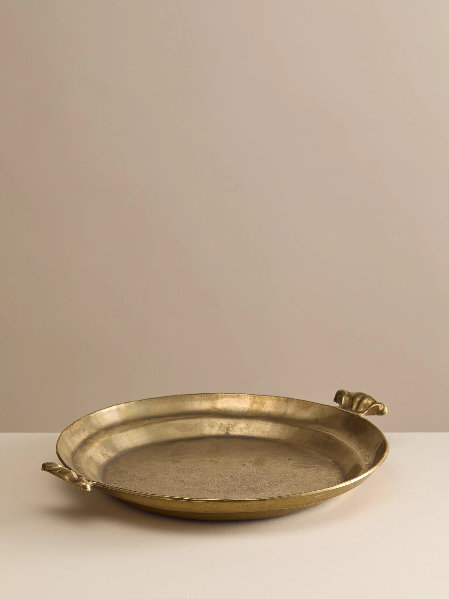 The Vintage Round Brass Serving Tray with Shell Motif Handles