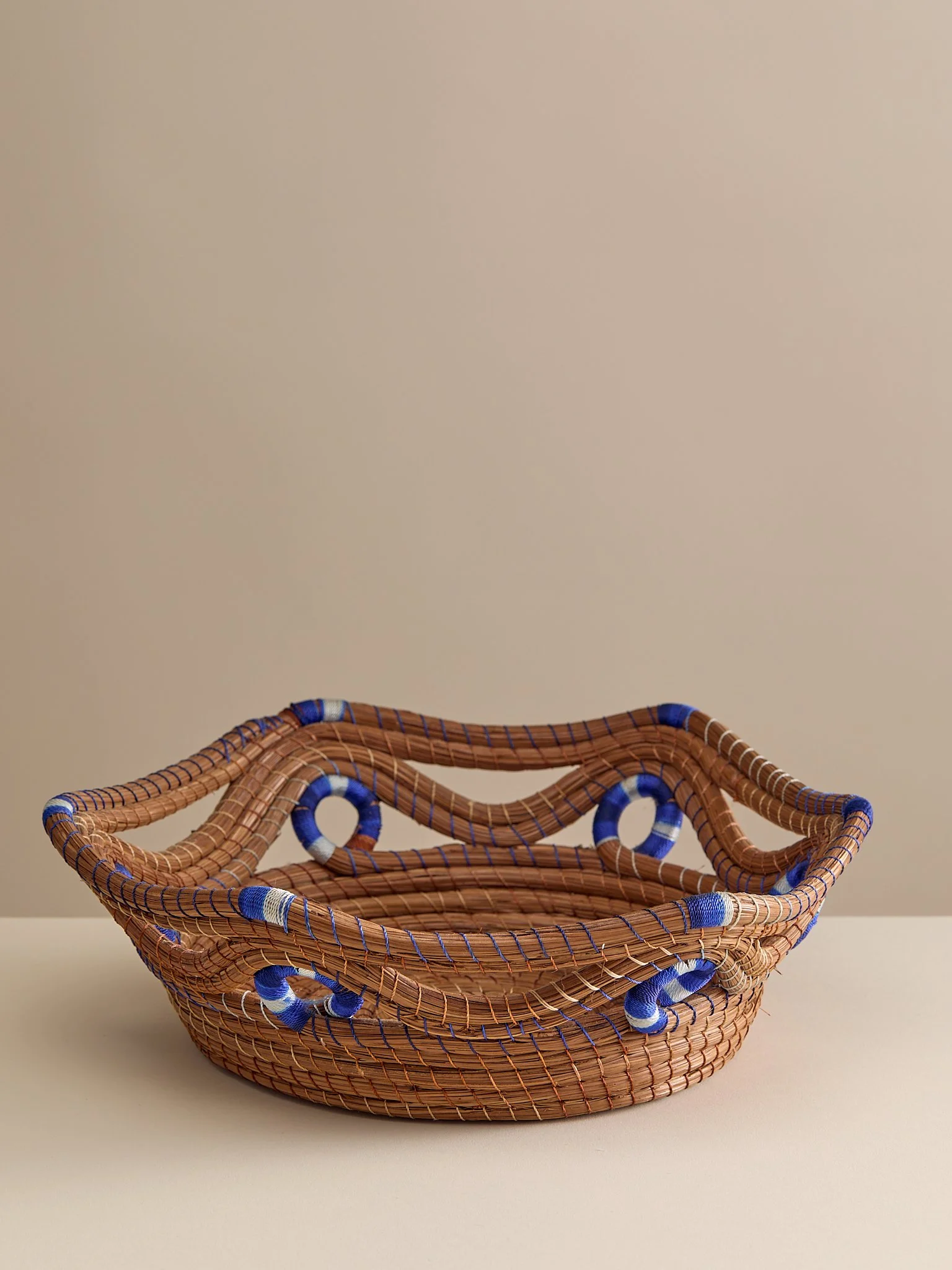 The Vintage Handwoven Basket with Blue and White Detail
