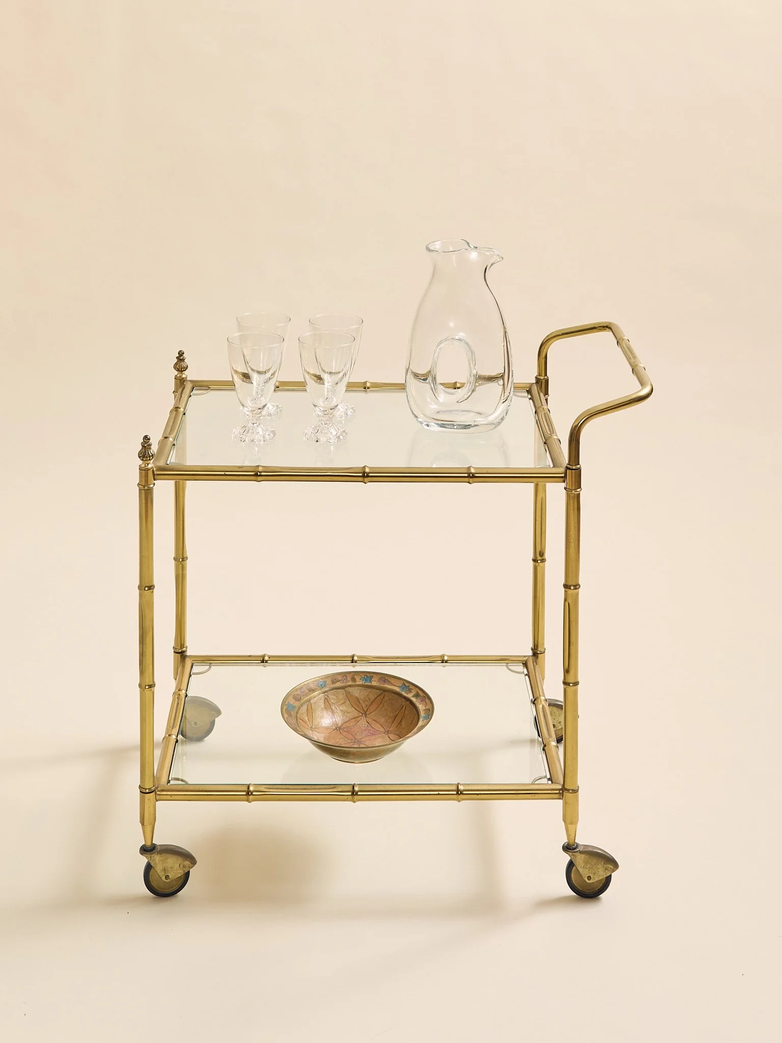The Vintage Hollywood Regency Faux Bamboo Brass Bar Cart