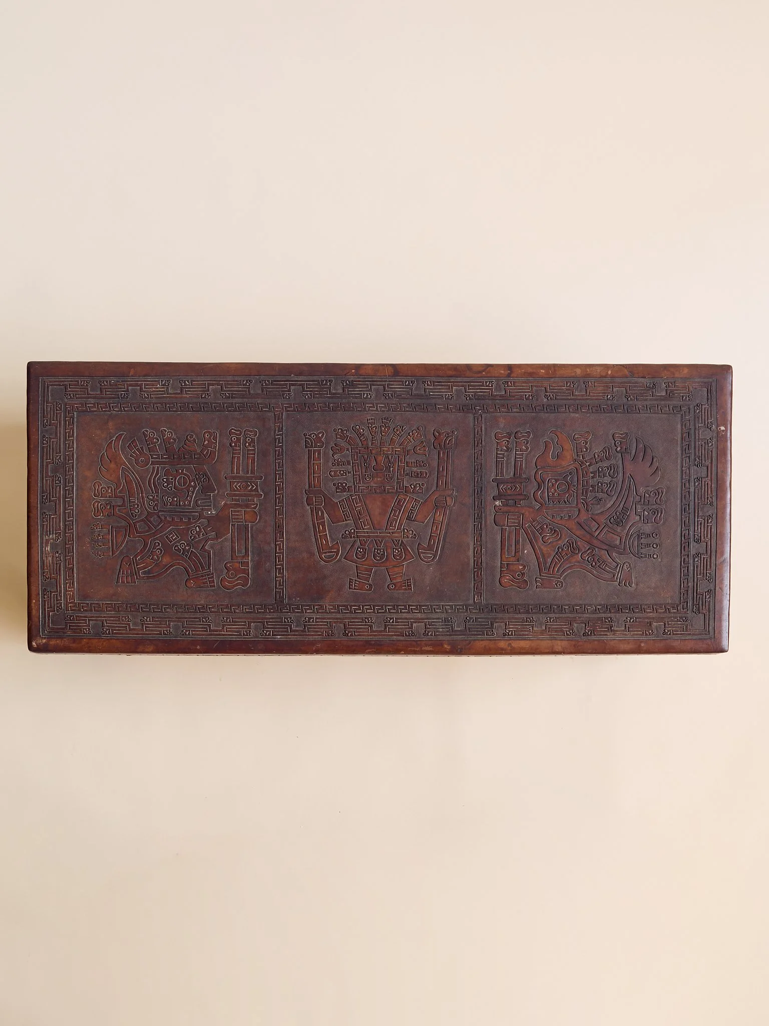 23_TheVintagePeruvianLeatherCarvedCoffeeTable_005.jpg