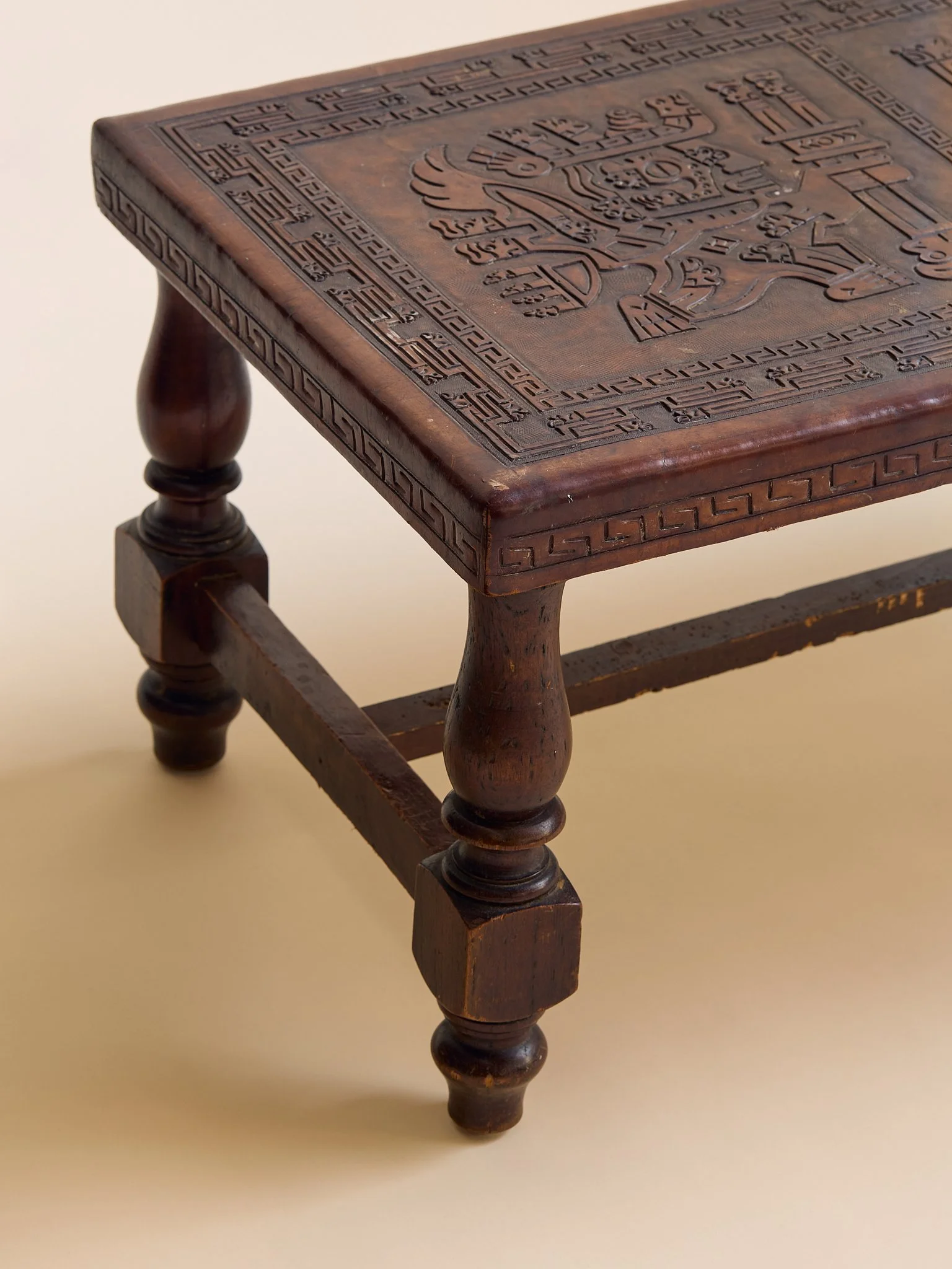 23_TheVintagePeruvianLeatherCarvedCoffeeTable_009.jpg