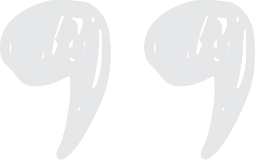 Two large quotation marks, light gray on a white background.