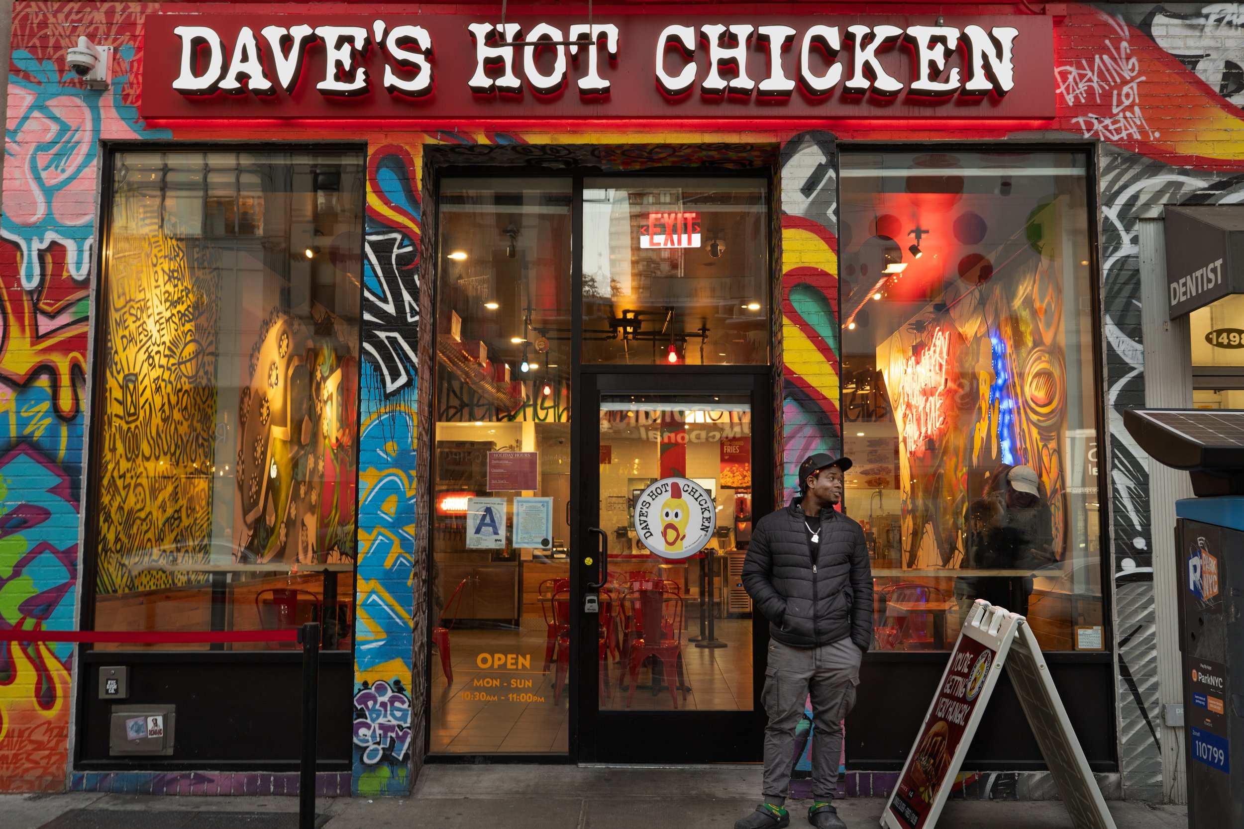 MANHATTAN, N.Y., January 2025 — Asse Bamba stands outside his workplace.