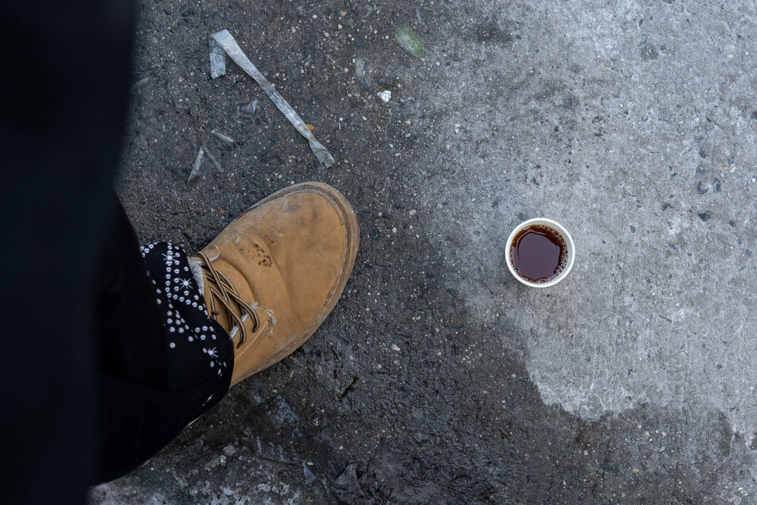 Canal street, February 2026 — Tea sold by Betty. She says fears of arrest over counterfeit goods, along with the winter cold, led her to switch from selling counterfeit accessories to selling tea to fellow vendors.