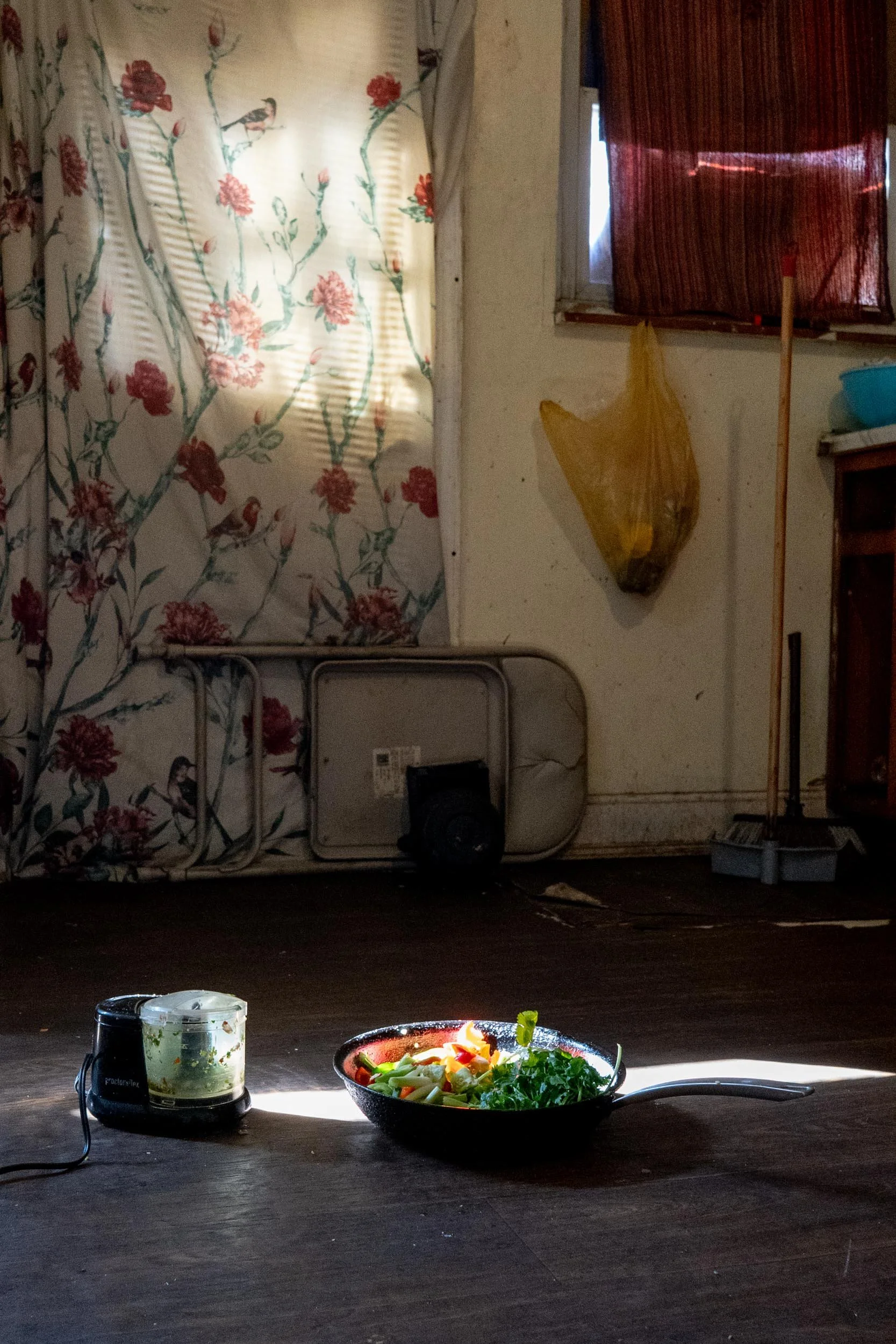 Bronx, New York — Lama is cooking for 4 other senegalese men who live together.