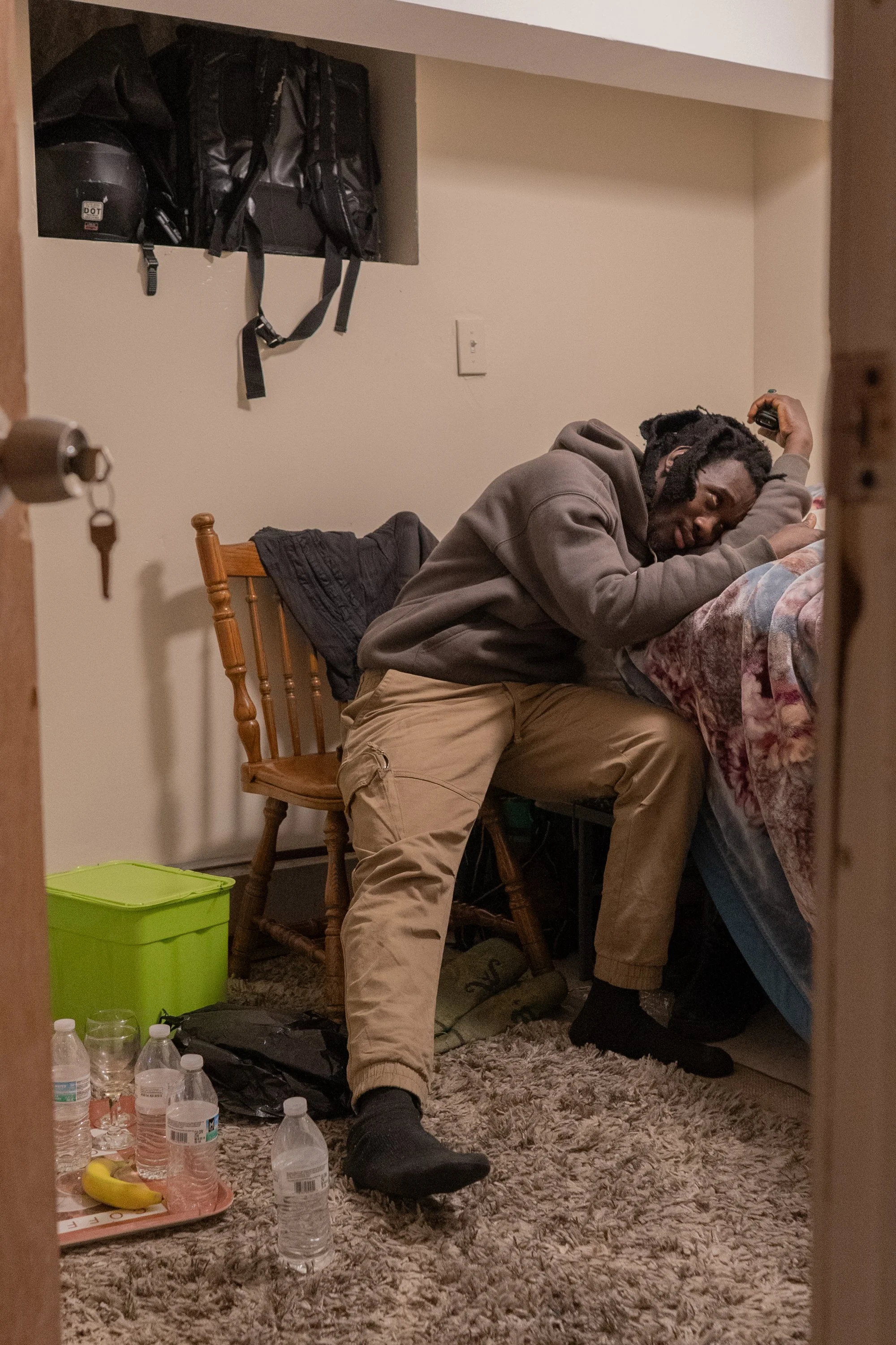 Bronx, March 2026 — Souleuye in his apartment.