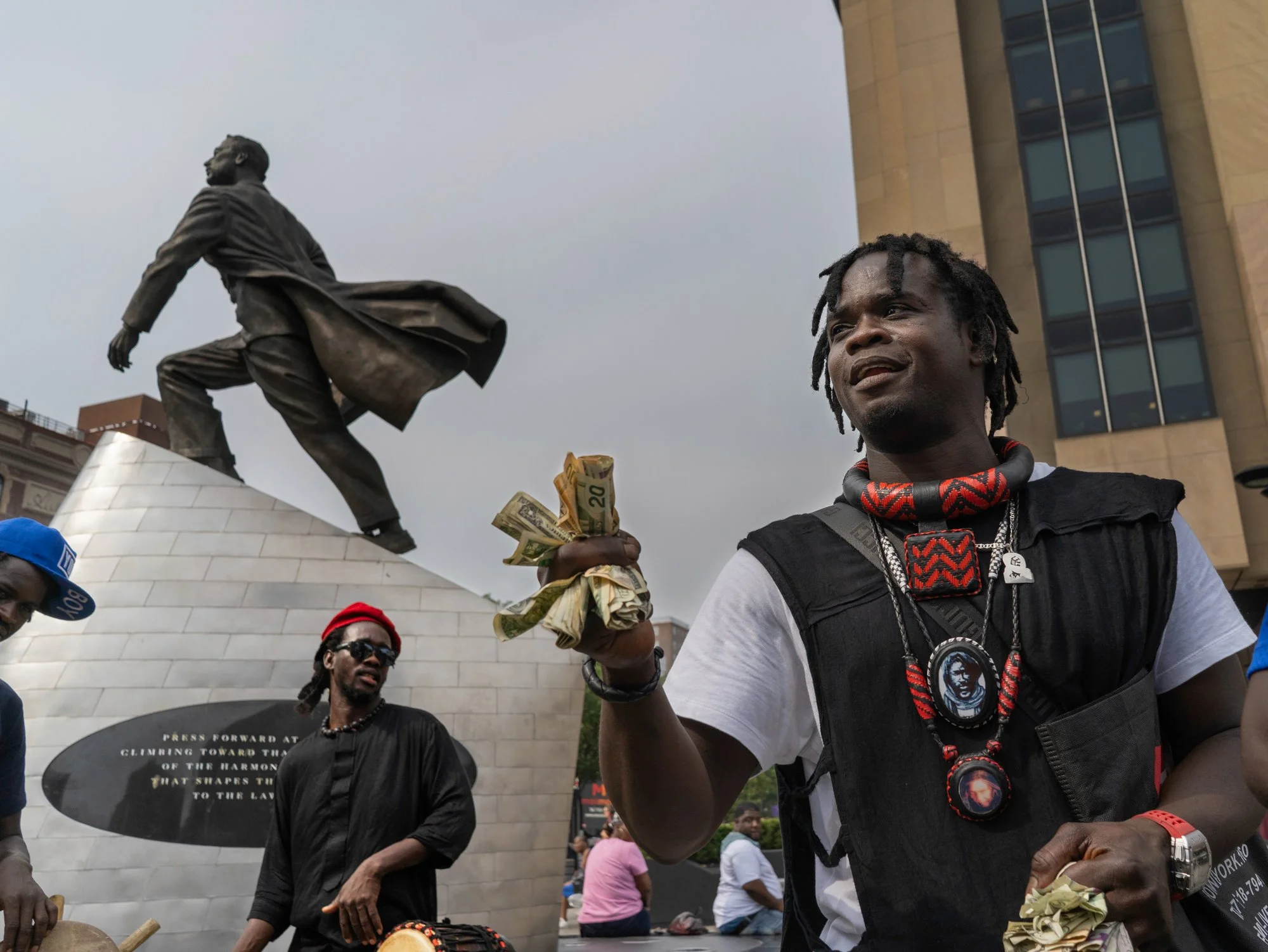 HARLEM, N.Y., July 2026 — Asse Bamba (a nickname) asks for donations for a large religious festival being held in New York.