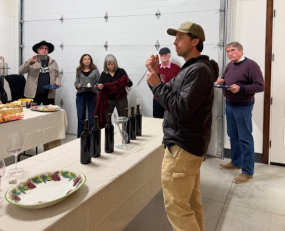 Winemaker sharing yearly vintage information to members