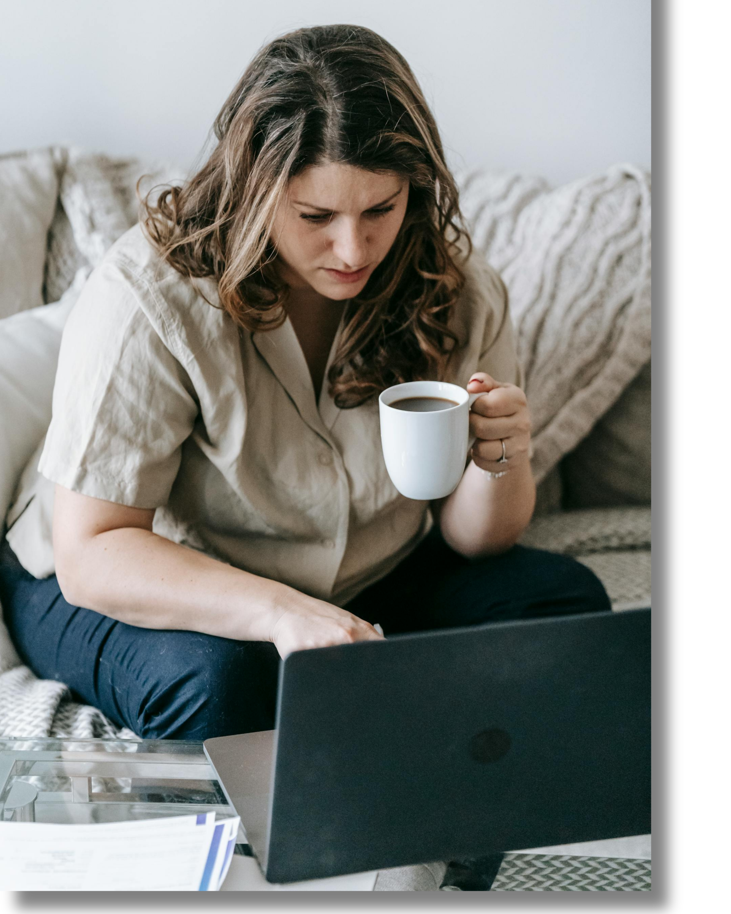 Parent participating in a virtual coaching session from home with a laptop