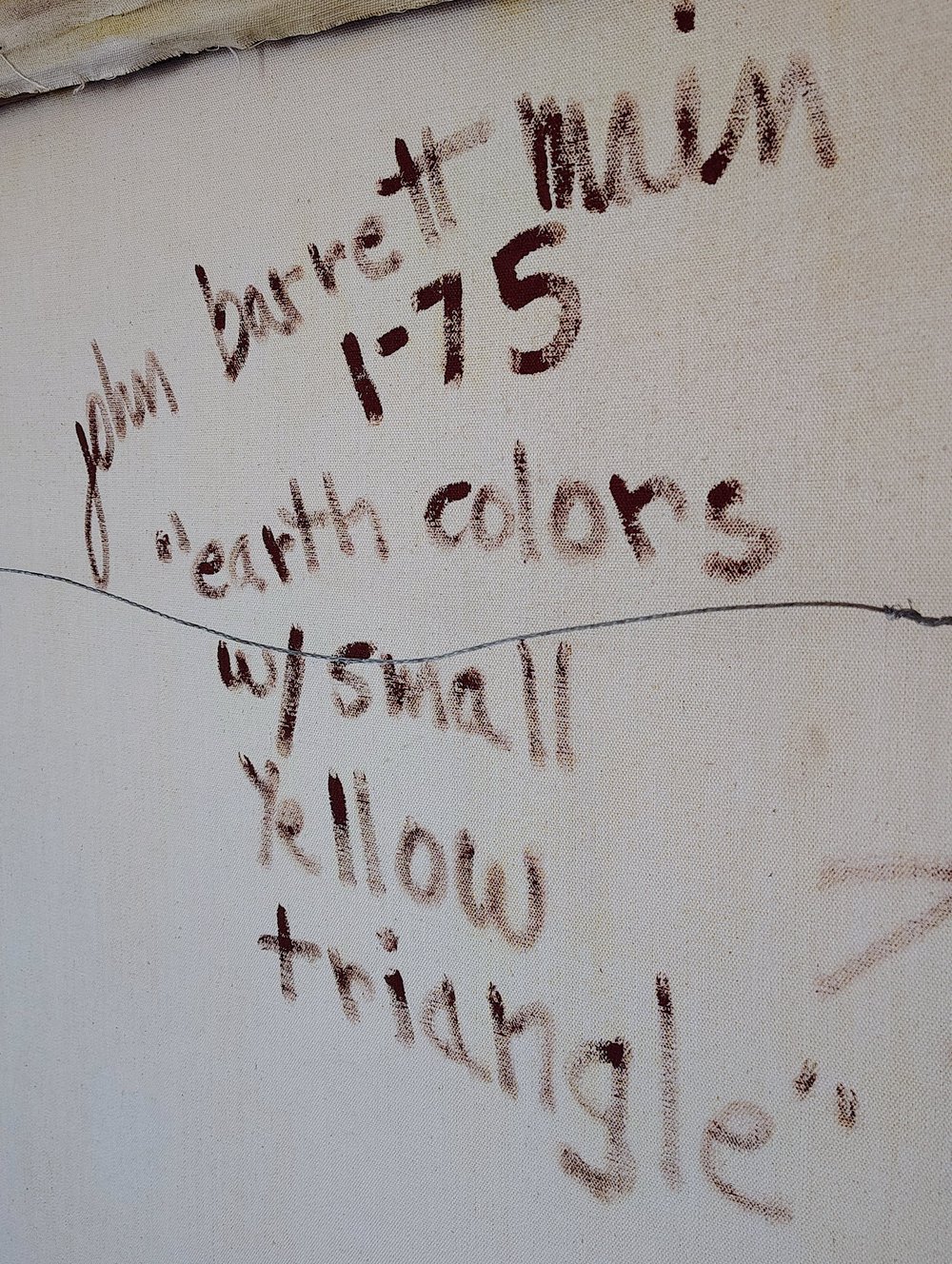 Close-up of John Barrett Main's handwritten name, January 1975 date and Earth Colors with Small Yellow Triangle description