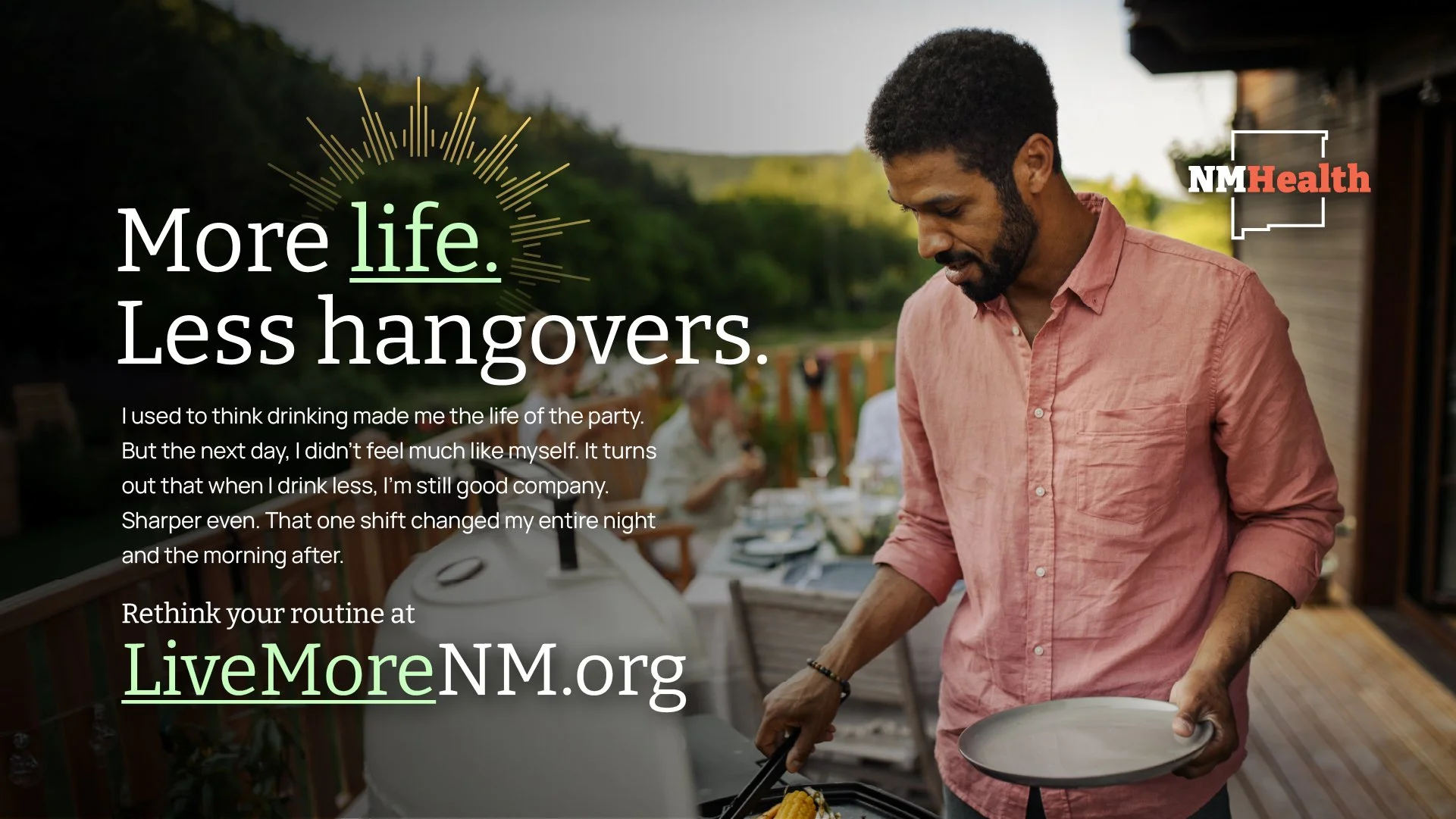 A man in a pink shirt is grilling food outdoors, with a table set for a gathering in the background. The image is accompanied by the LiveMoreNM.org logo and text promoting healthier living.