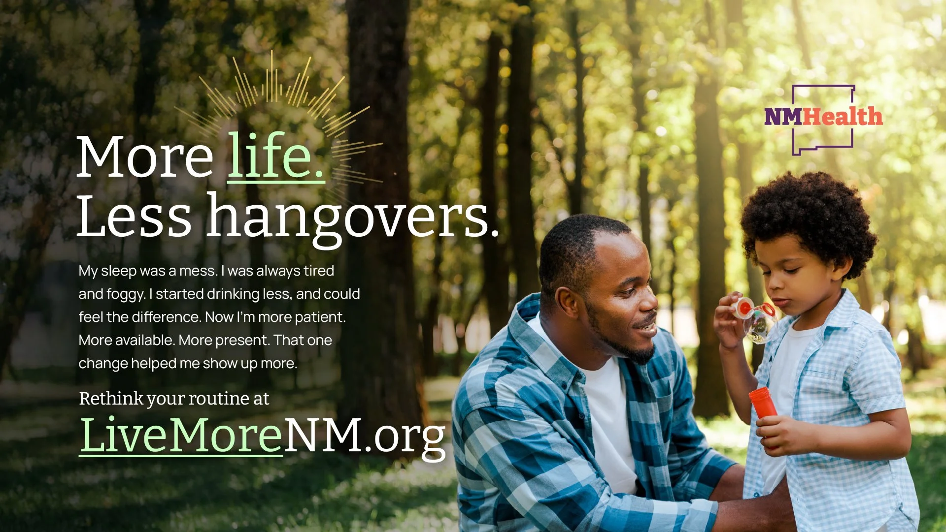 A man and a young boy outdoors in a park, with trees and sunlight in the background. The boy is holding a plastic bottle, and both are smiling, accompanied by the LiveMoreNM.org logo and text promoting healthier living.