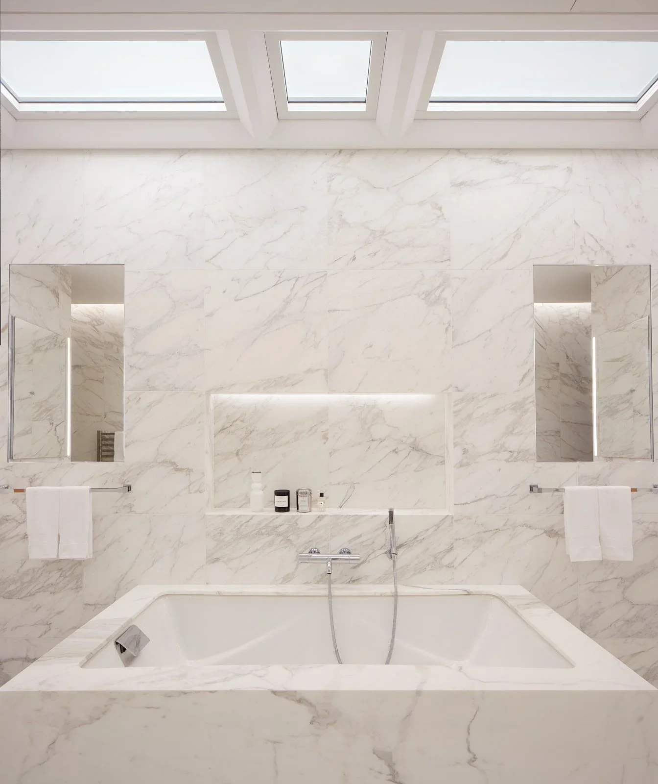 Bathroom in Central Park West residence, New York, featuring lighting design by Tirschwell Lighting, designed by William Leeds.