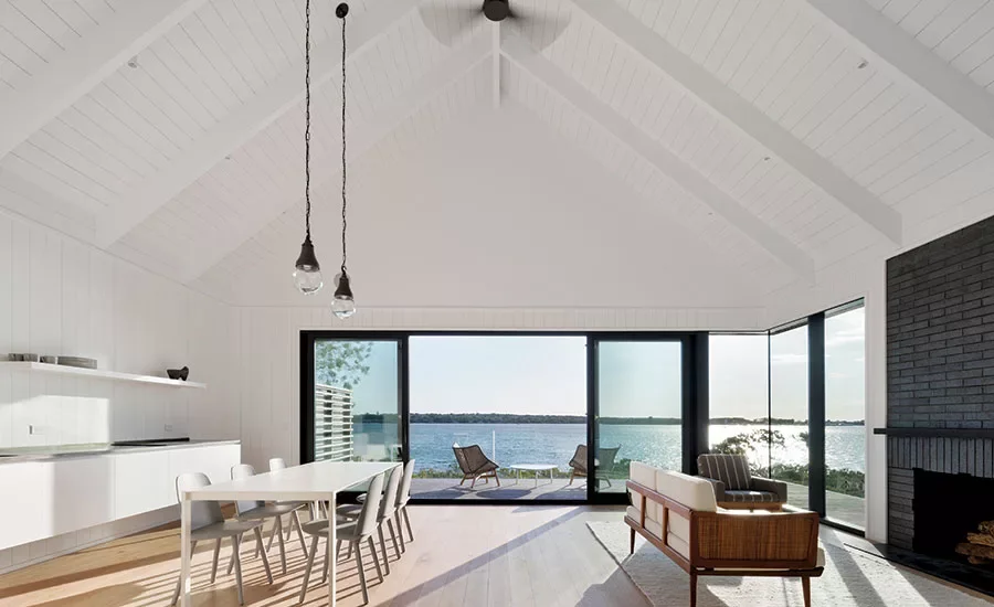 Residential interior at East Lake Montauk home, with lighting design by Tirschwell Lighting, designed by Robert Young.