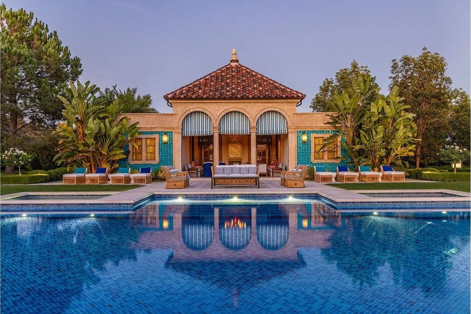 Exterior of residence in Rancho Santa Fe, with lighting design by Tirschwell Lighting, architecture by Shubin Donaldson, interiors by Lucas Interior, and landscape by Hocker Design.