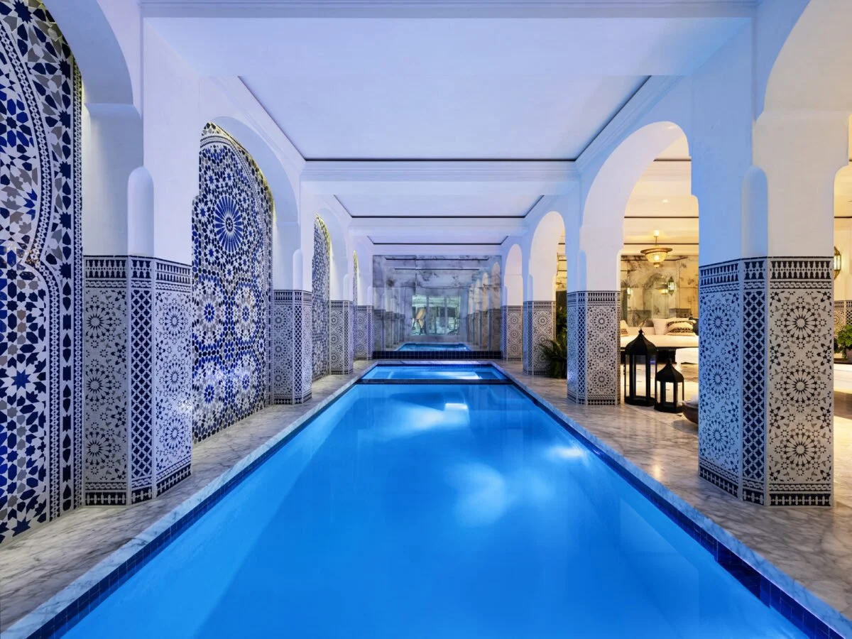Pool and spa in Rancho Santa Fe, featuring lighting design by Tirschwell Lighting, designed by Shubin Donaldson with interiors by Lucas Interior and landscape by Hocker Design.