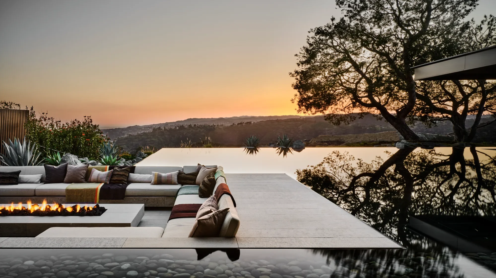 Exterior of Trousdale residence in Beverly Hills, featuring lighting design by Tirschwell Lighting, designed by Shubin Donaldson with landscape by Hocker Design.