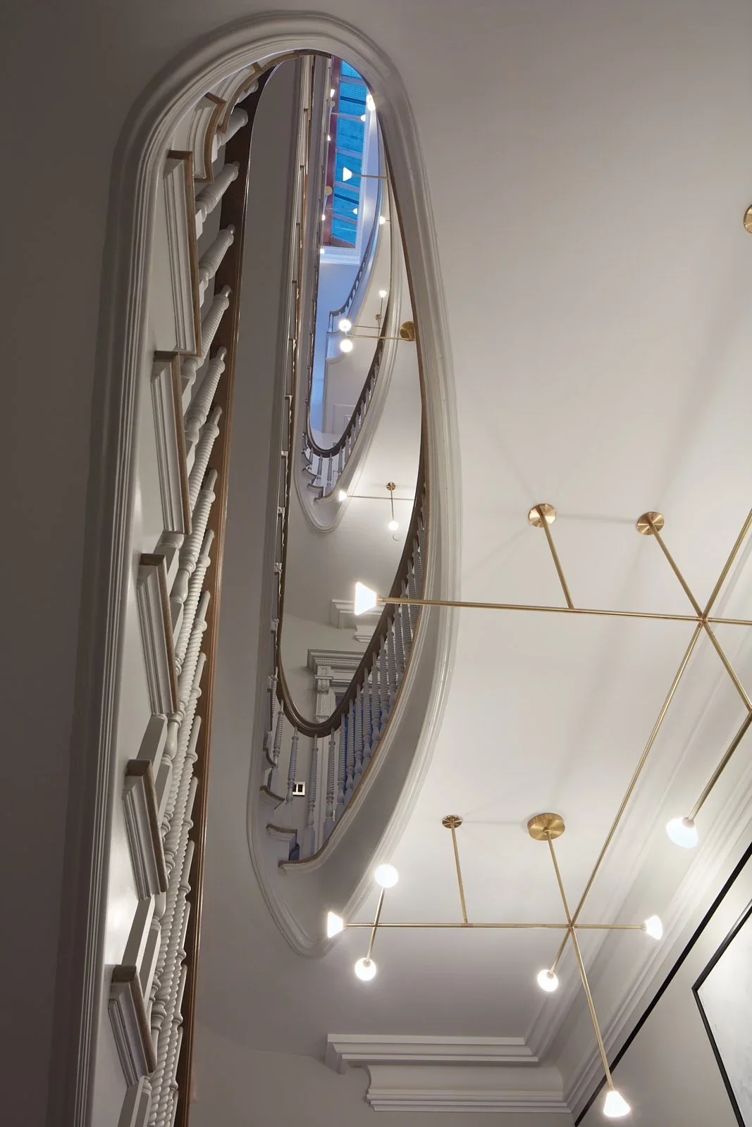 Stairwell in Central Park West residence, New York, featuring lighting design by Tirschwell Lighting, designed by William Leeds.