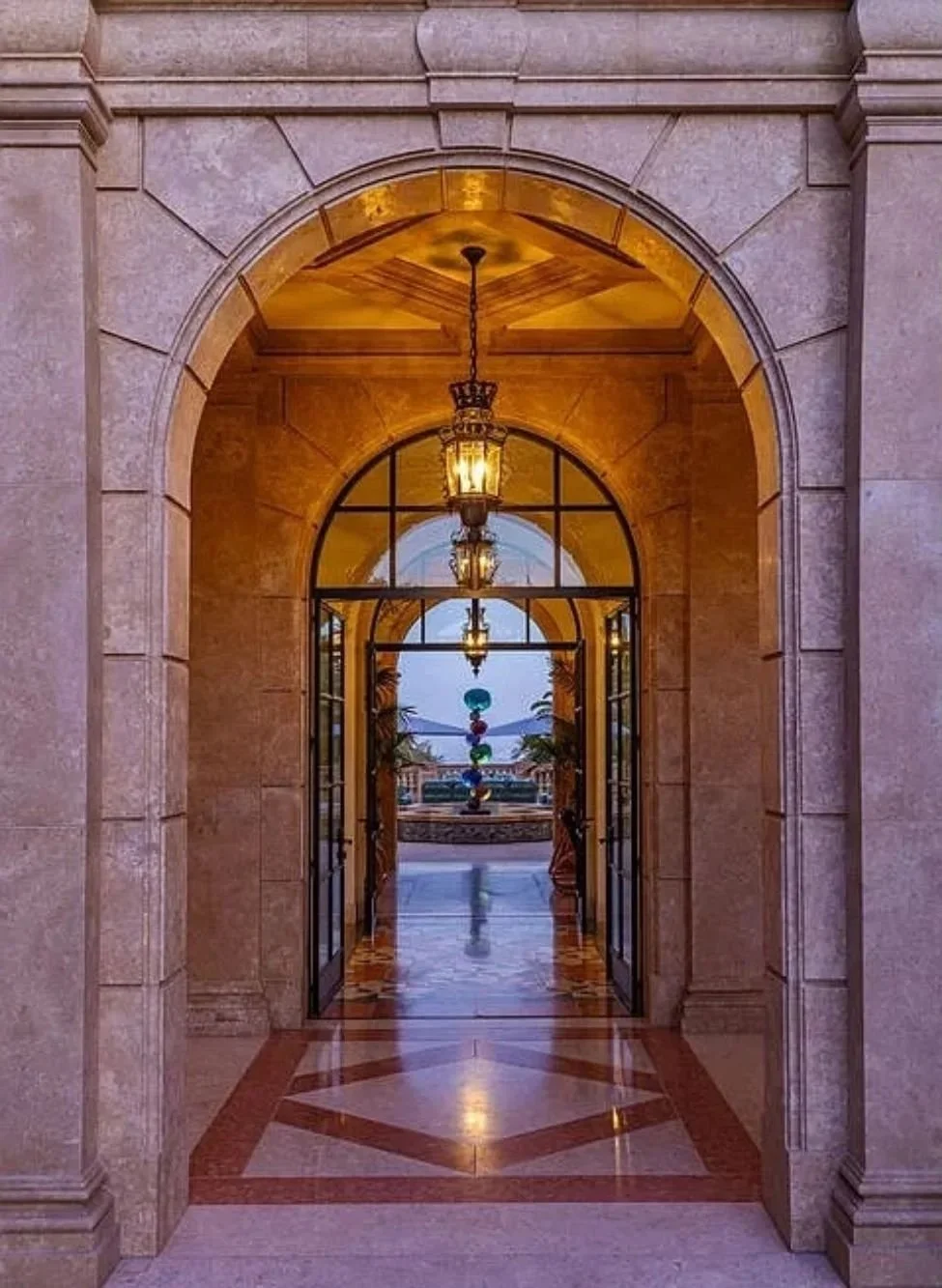 Entry lighting design of Bel Air residence by Tirschwell Lighting Design