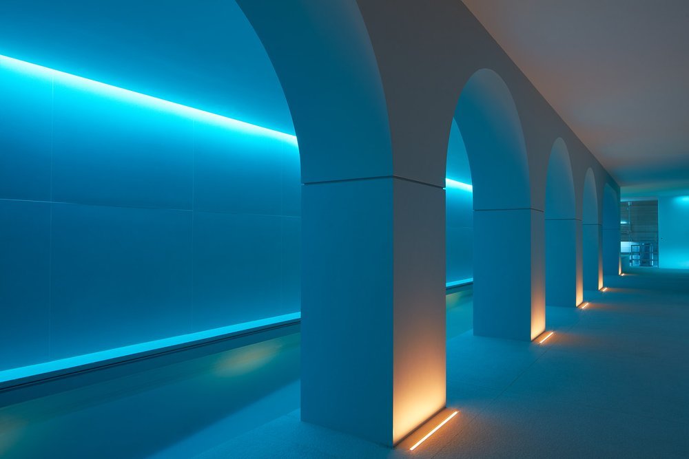 Indoor pool at Central Park West residence, New York, featuring lighting design by Tirschwell Lighting, designed by William Leeds.